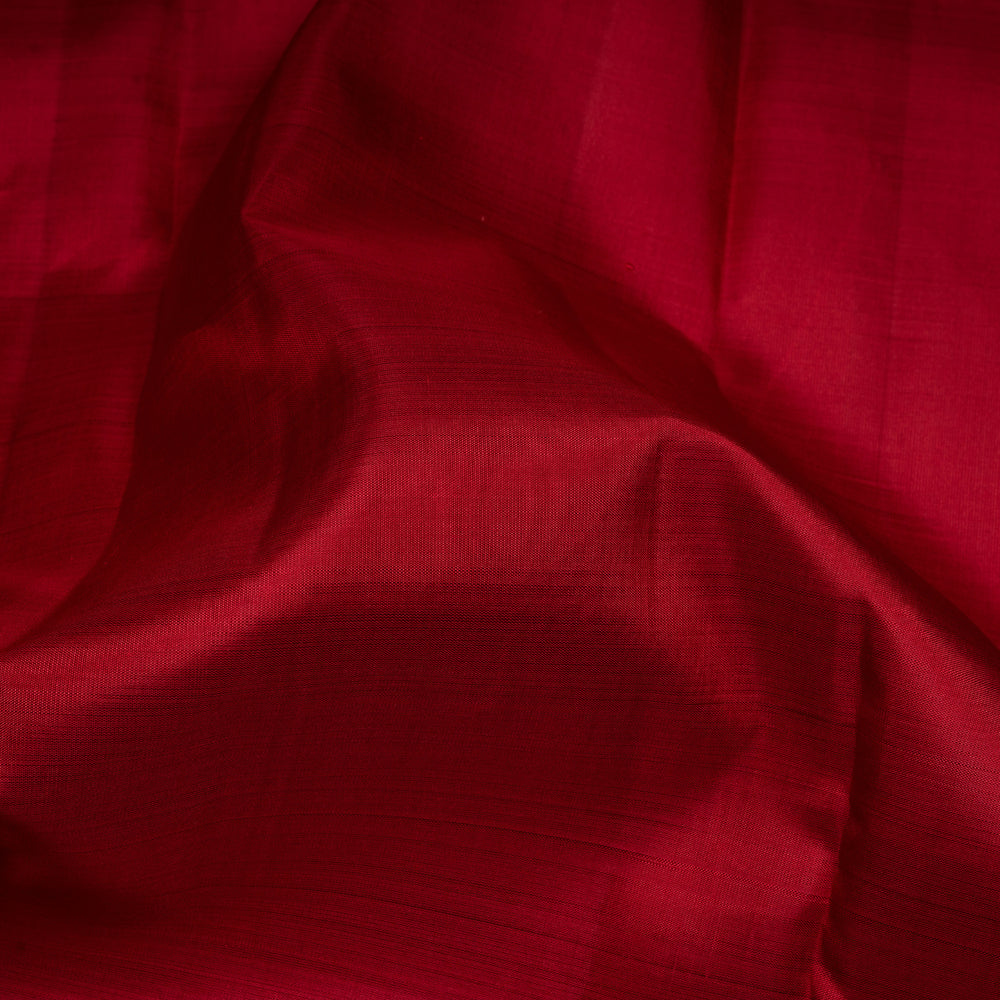 Close-up of red fabric with visible texture
