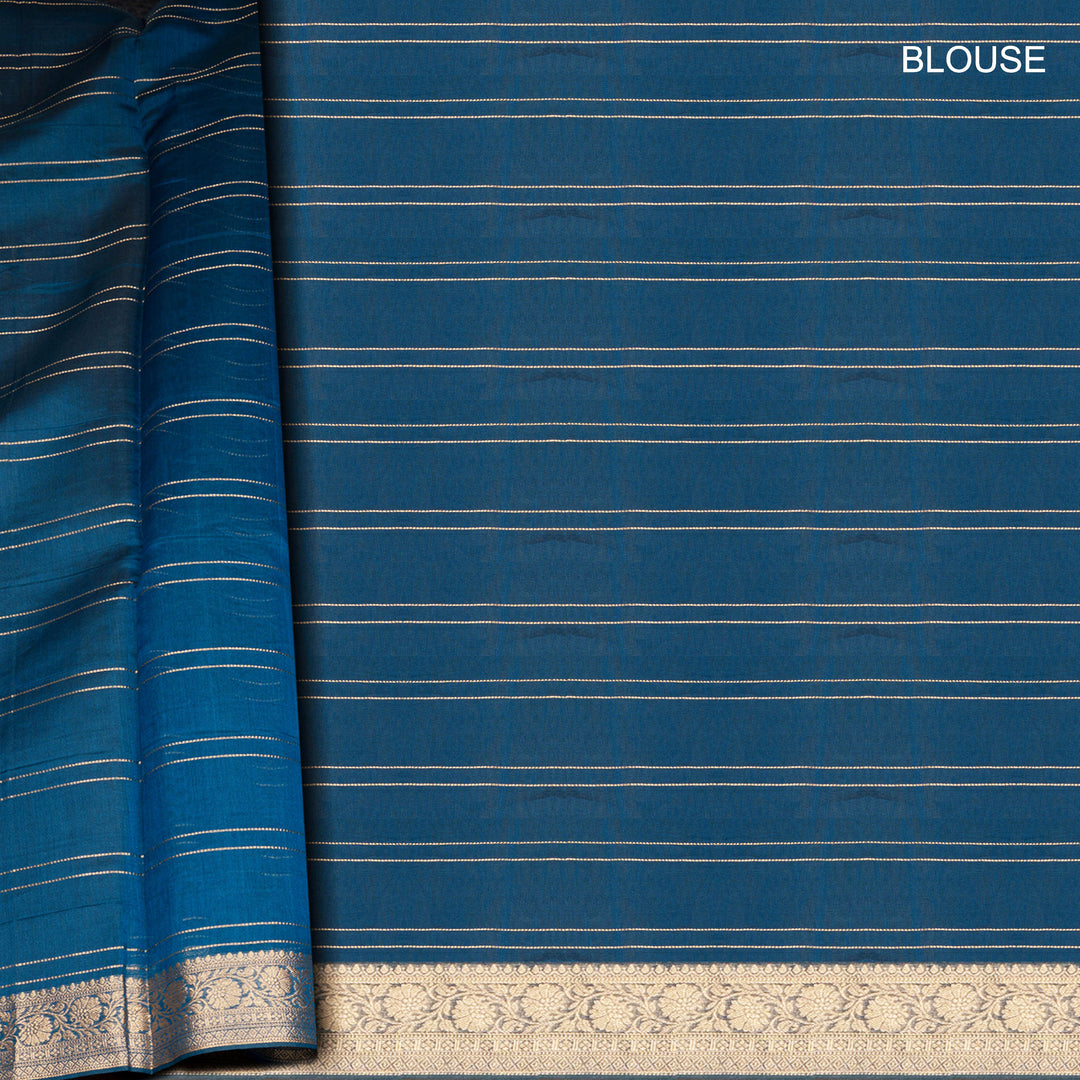 Blue checked silk cotton saree with gold zari border featuring leaf motifs and dotted check pattern
