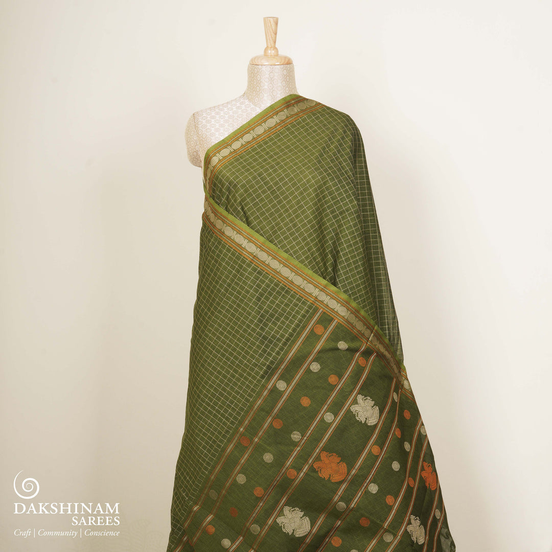 Green Kanchi cotton saree with checks, rudraksh butta border, chevron design and traditional pallu with matching blouse