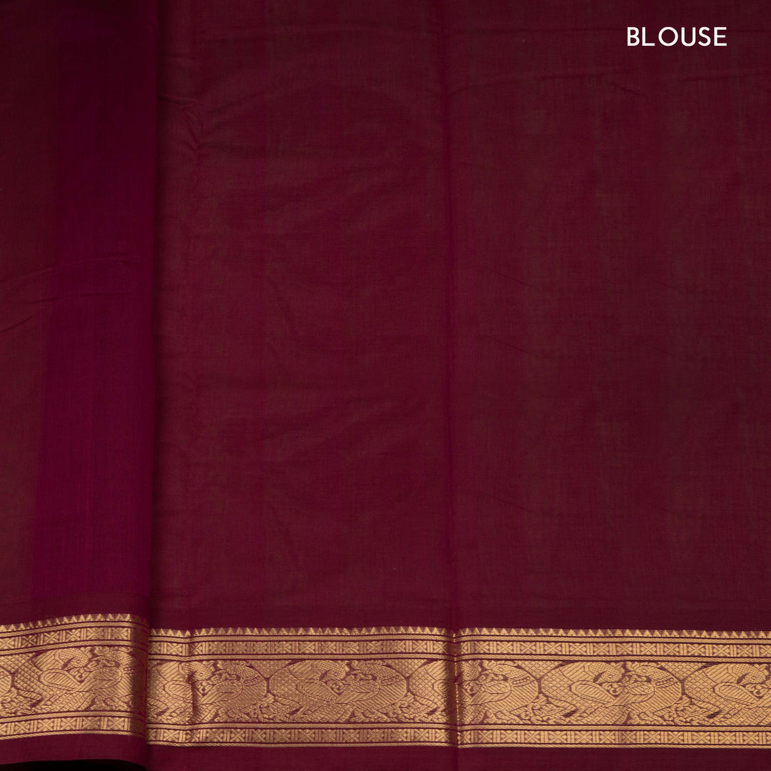 Maroon Kanchi cotton saree with kili motif body, mayil motif border and rich traditional pallu with matching blouse