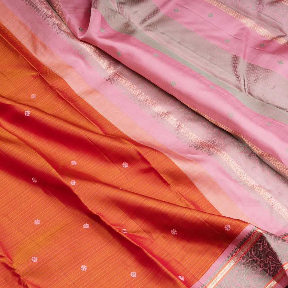 Orange Kanjivaram silk saree with floral butta, pink annam border and traditional pallu with matching blouse