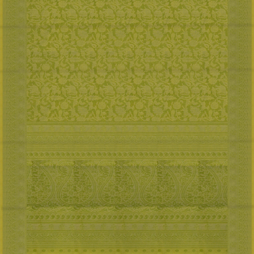Lime green South cotton saree with floral body featuring peacock, horse, elephant, deer and tiger motifs, traditional border and paisley pallu, matching blouse with dot design.