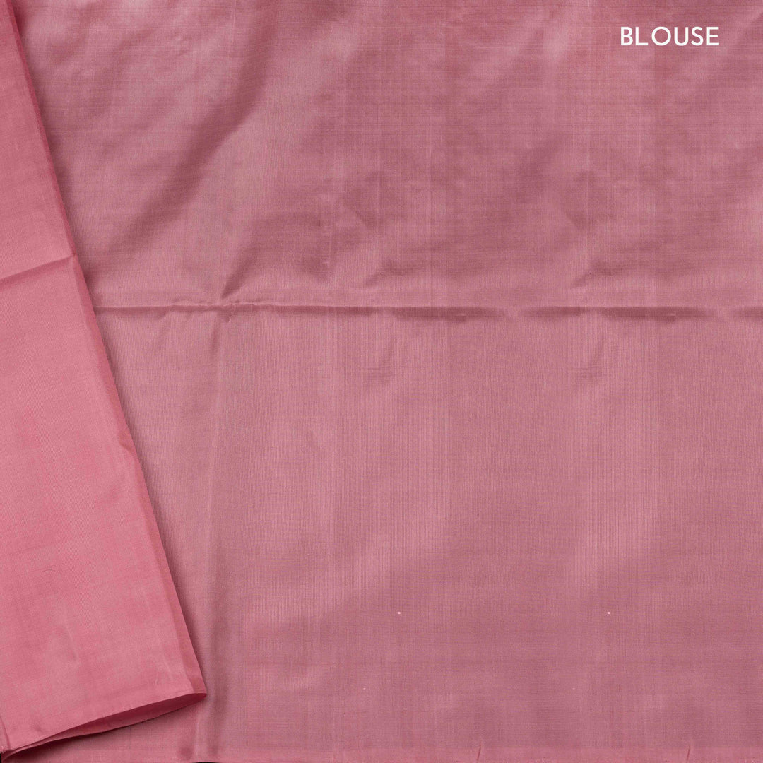 Light pink borderless soft silk saree with dotted lines, geometric square and rectangle patterns with silver zari and striped pallu.