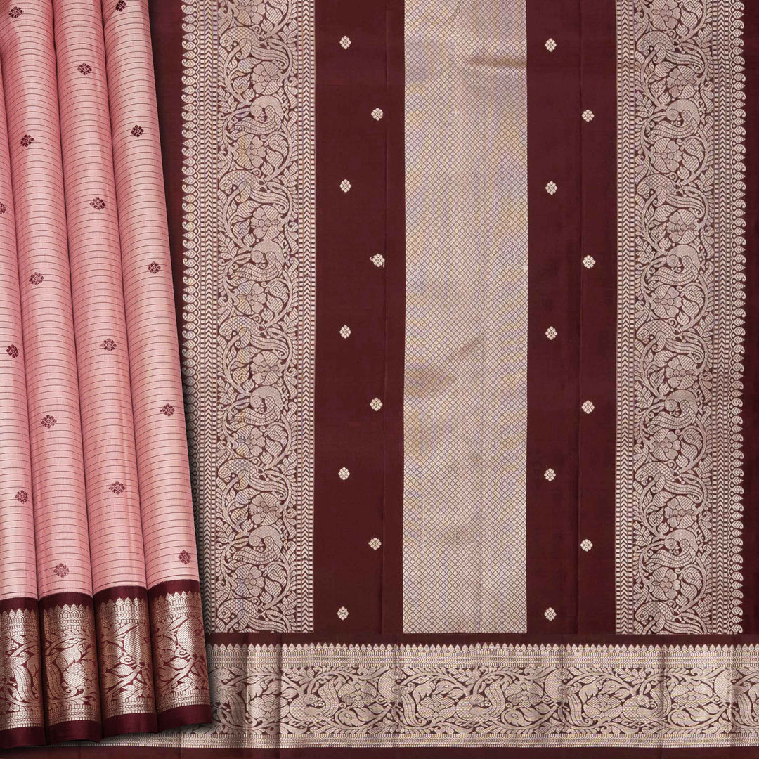 Peach handwoven Kanjivaram silk saree with horizontal stripes and chakram buttas, maroon border with parrot and floral motifs, and matching maroon blouse.