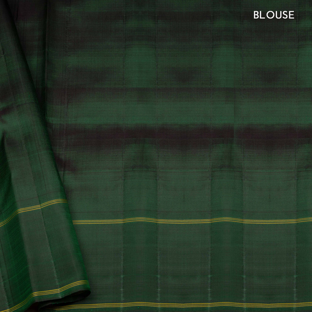 Multicolor handwoven Kanjivaram silk saree with checkered body, korvai thazampoo motifs, green rettapet border, and temple design pallu, paired with green blouse.