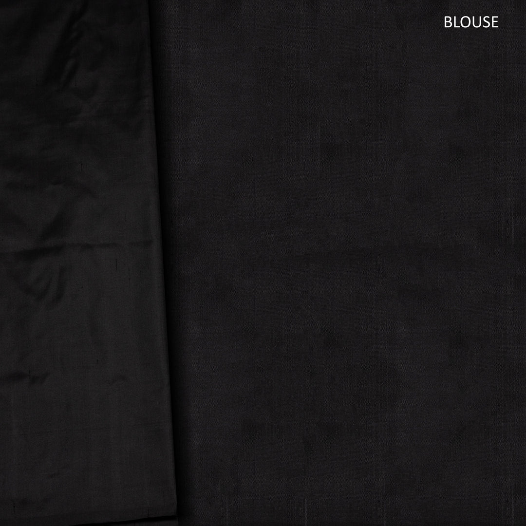 Red Pochampally Ikat silk saree with yellow ikat border, black panel, and black and white ikat pallu, paired with plain black blouse.