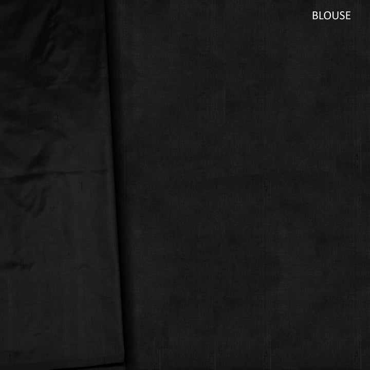 Red Pochampally Ikat silk saree with yellow ikat border, black panel, and black and white ikat pallu, paired with plain black blouse.