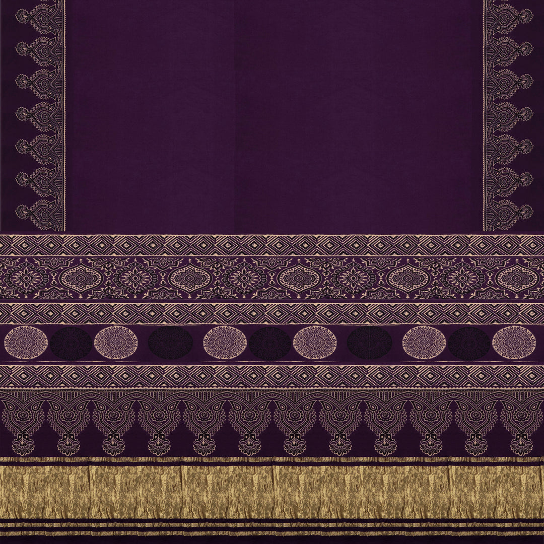 Violet handwoven modal silk saree with plain violet body, Ajrakh printed border, gold zari pallu, paired with a violet Ajrakh design blouse.