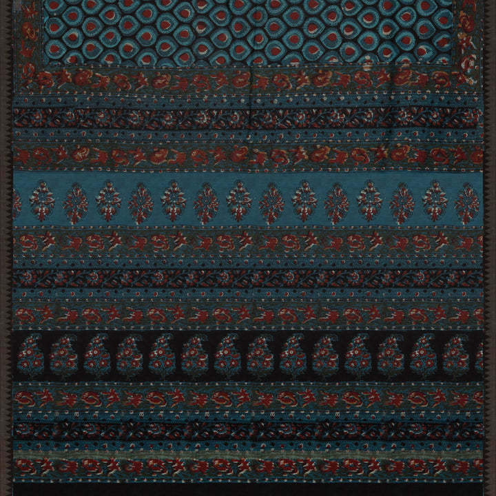 Blue handwoven Chanderi silk saree with Ajrakh print, gicha temple border, floral pallu design, paired with light blue blouse with chevron lines.