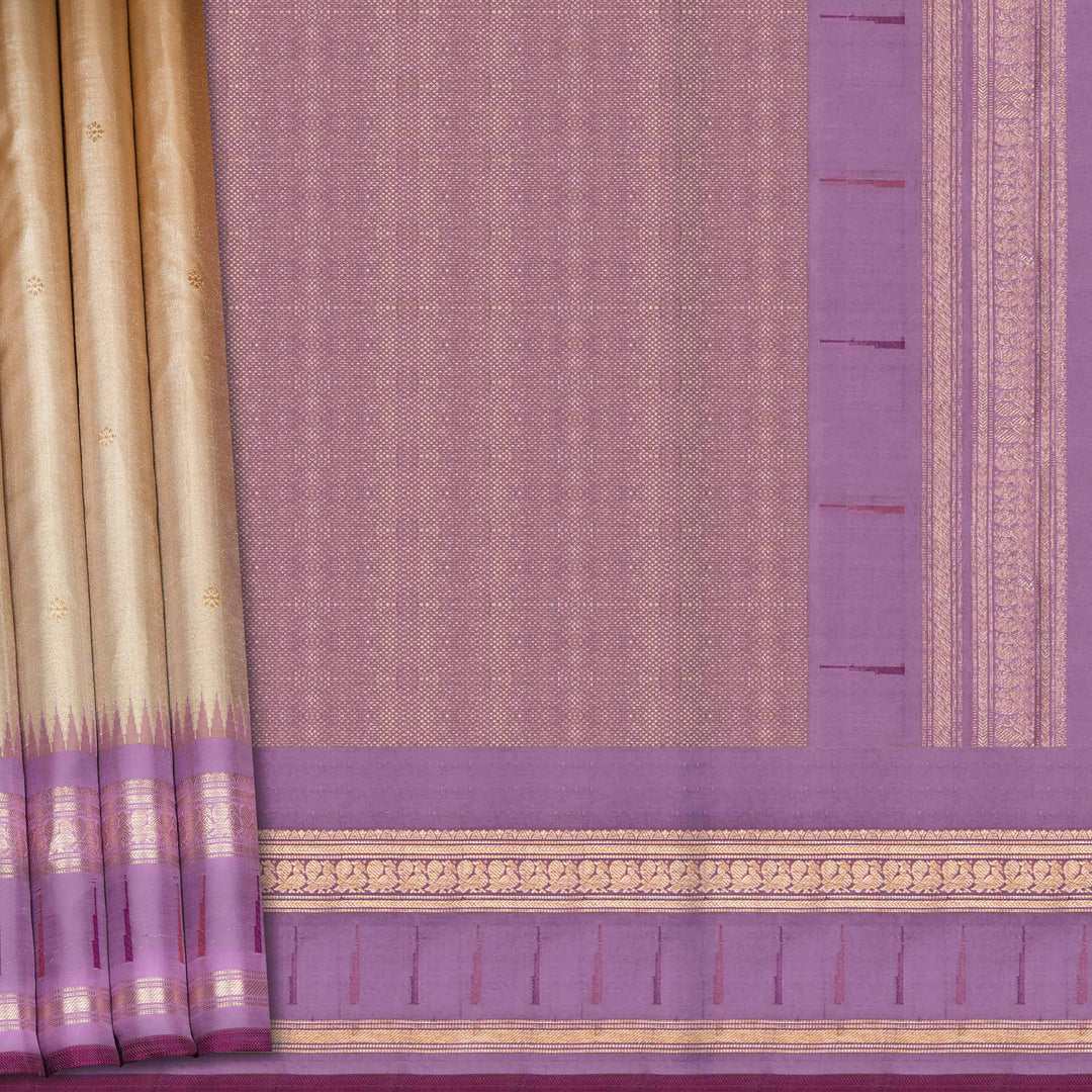 Cream Kanjivaram silk saree with tissue body, silver zari floral butta, lavender Paithani border and annam design pallu with matching blouse