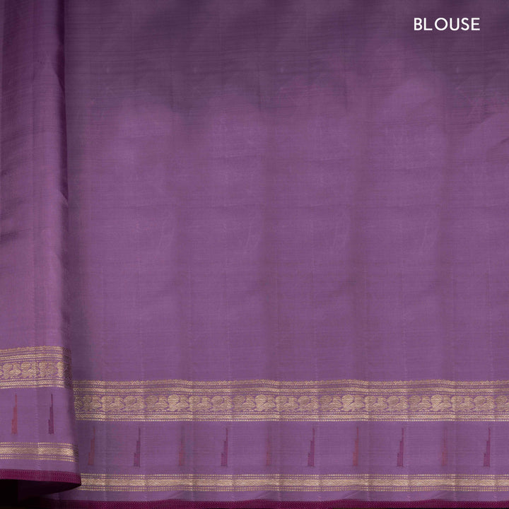 Cream Kanjivaram silk saree with tissue body, silver zari floral butta, lavender Paithani border and annam design pallu with matching blouse