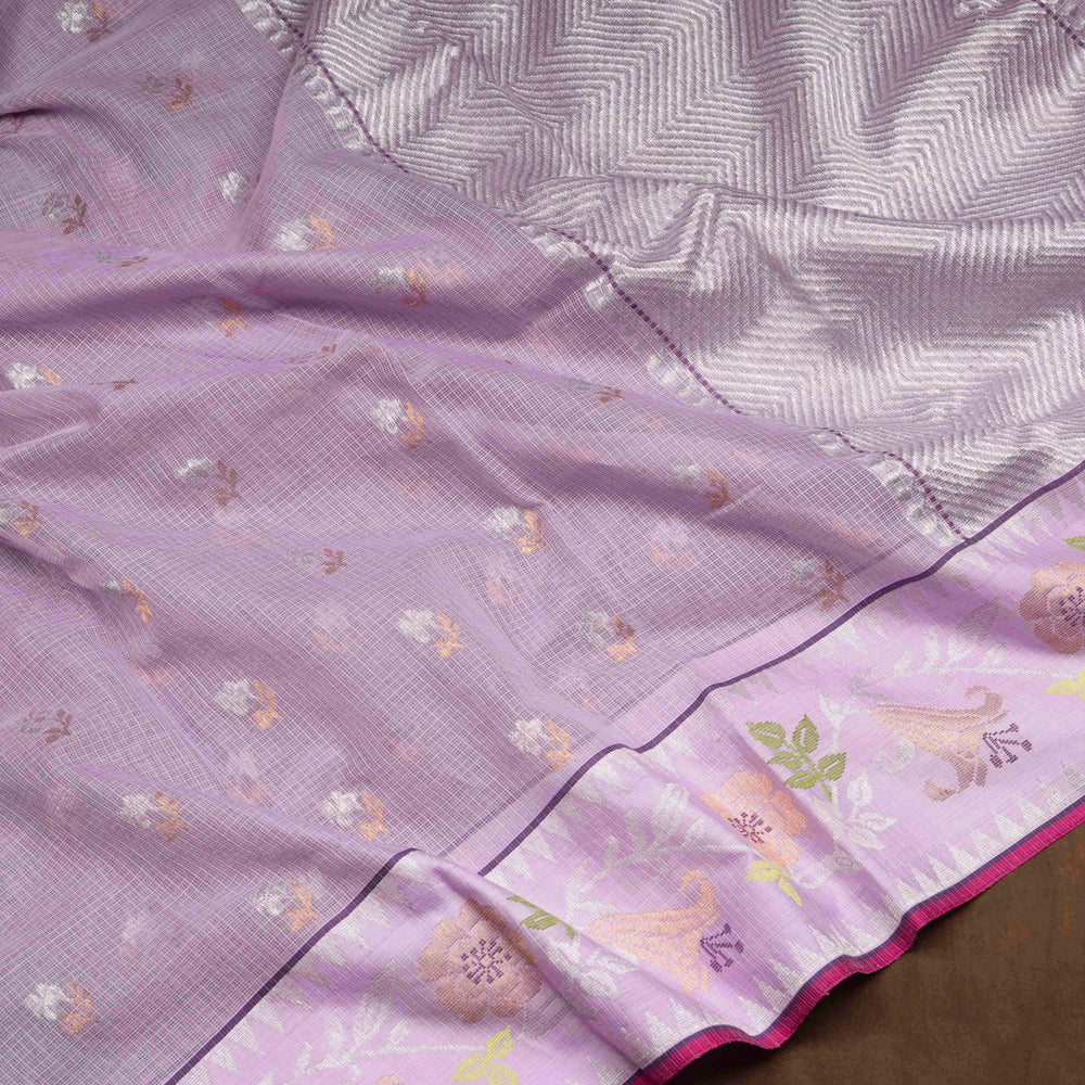 Purple Kota doria silk saree with silver zari floral butta, chevron pallu and floral zari border with yellow blouse