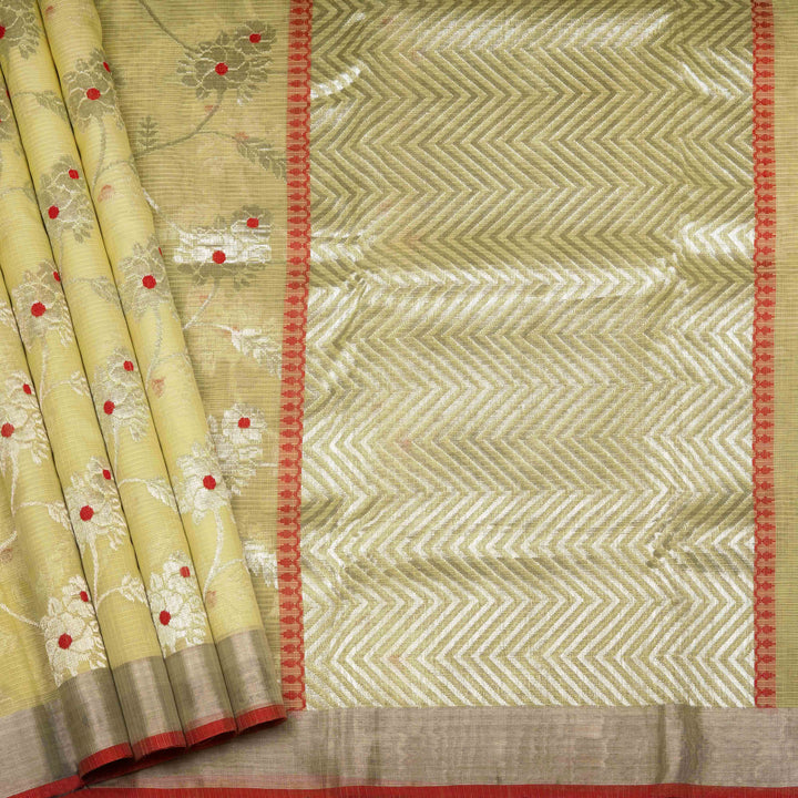Lime yellow Kota doria silk saree with silver zari floral lines, chevron pallu and panel border with red blouse