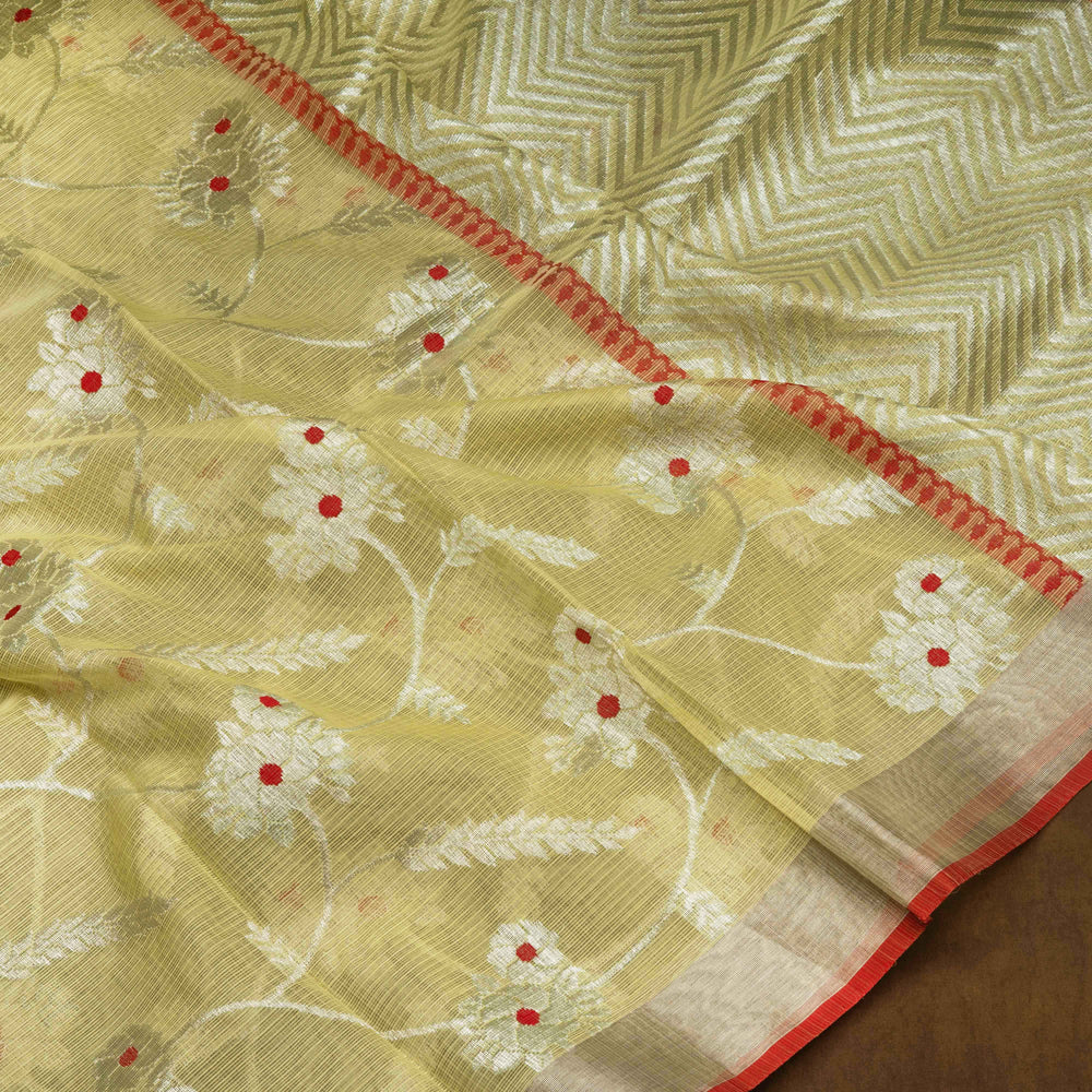 Lime yellow Kota doria silk saree with silver zari floral lines, chevron pallu and panel border with red blouse