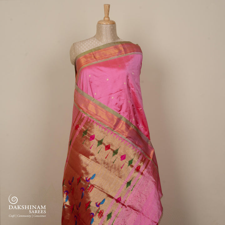 Pink silk Paithani saree with mango butta, diamond zari border and bird Paithani pallu with paneled lines and matching blouse