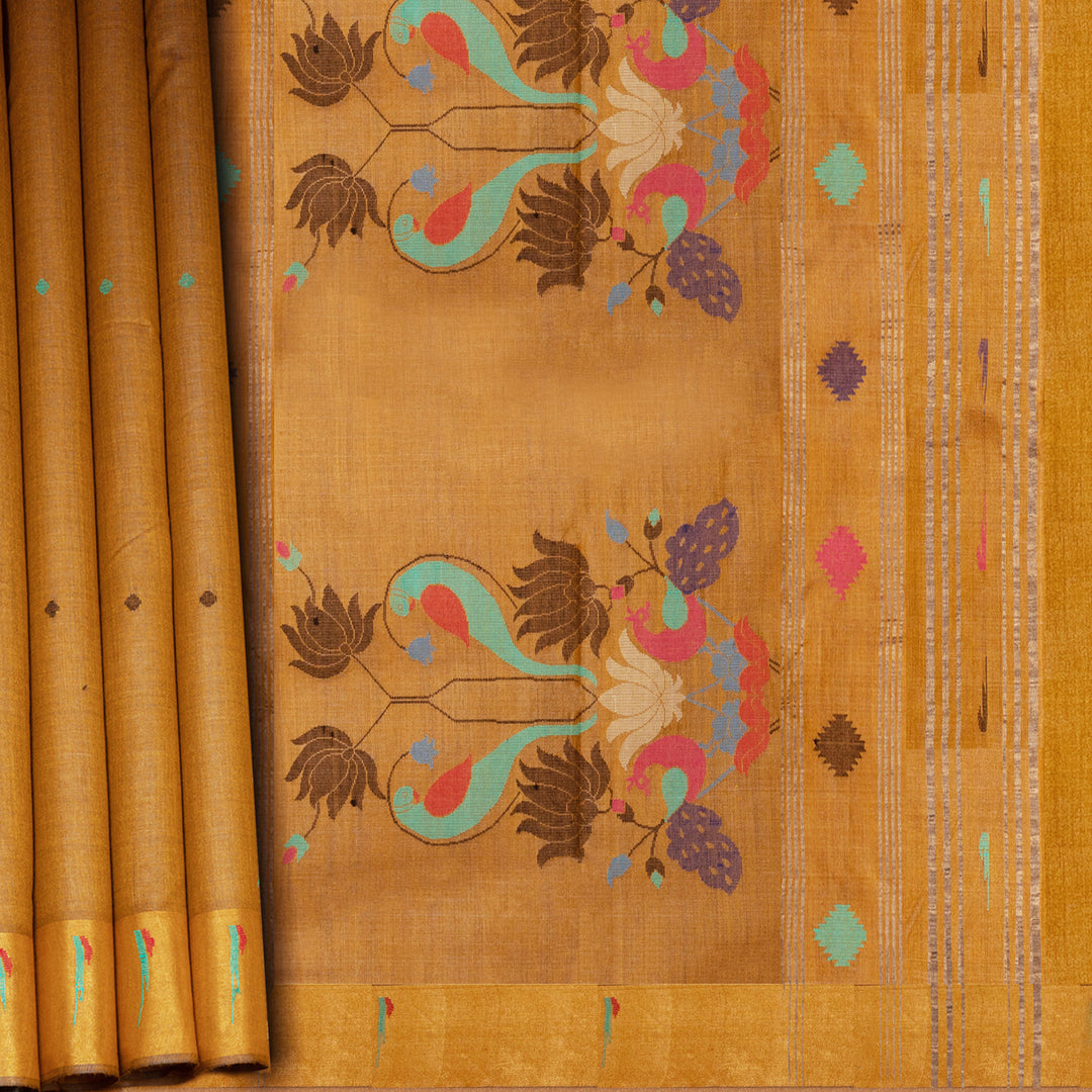 Mustard tussar silk Paithani saree with dotted body, gold zari border and multicolor bird jamdani pallu with matching blouse