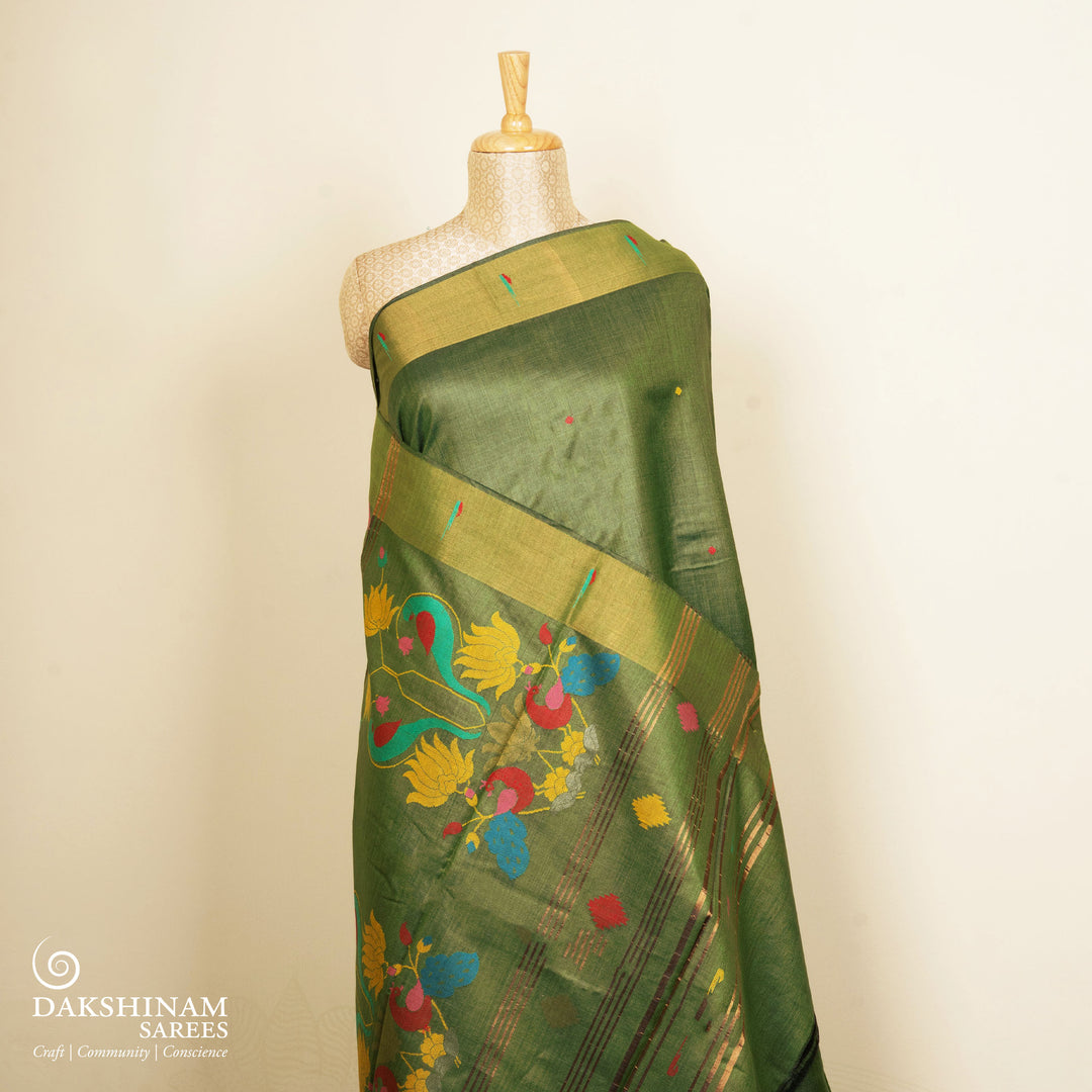 Green tussar silk Paithani saree with dotted body, gold zari border and multicolor bird jamdani pallu with matching blouse