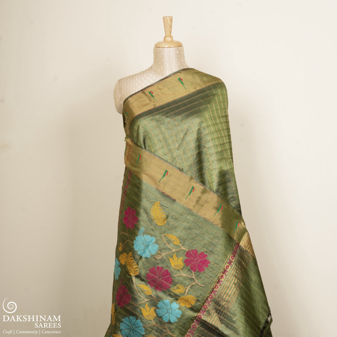 Green tussar silk Paithani saree with gold zari checks, Paithani border and multicolor jamdani floral pallu with matching blouse