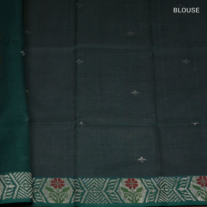 Moss green Kota doria silk saree with silver zari floral motifs, monotone border and pallu with silk thread flowers and chevron blouse