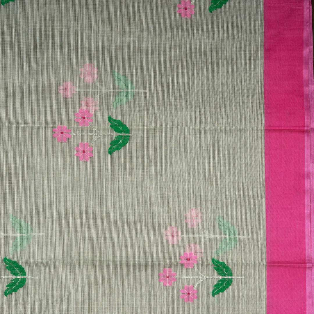 Light green Kota doria silk saree with silver zari floral motifs, silk thread flowers, diamond pallu and pink border with matching blouse