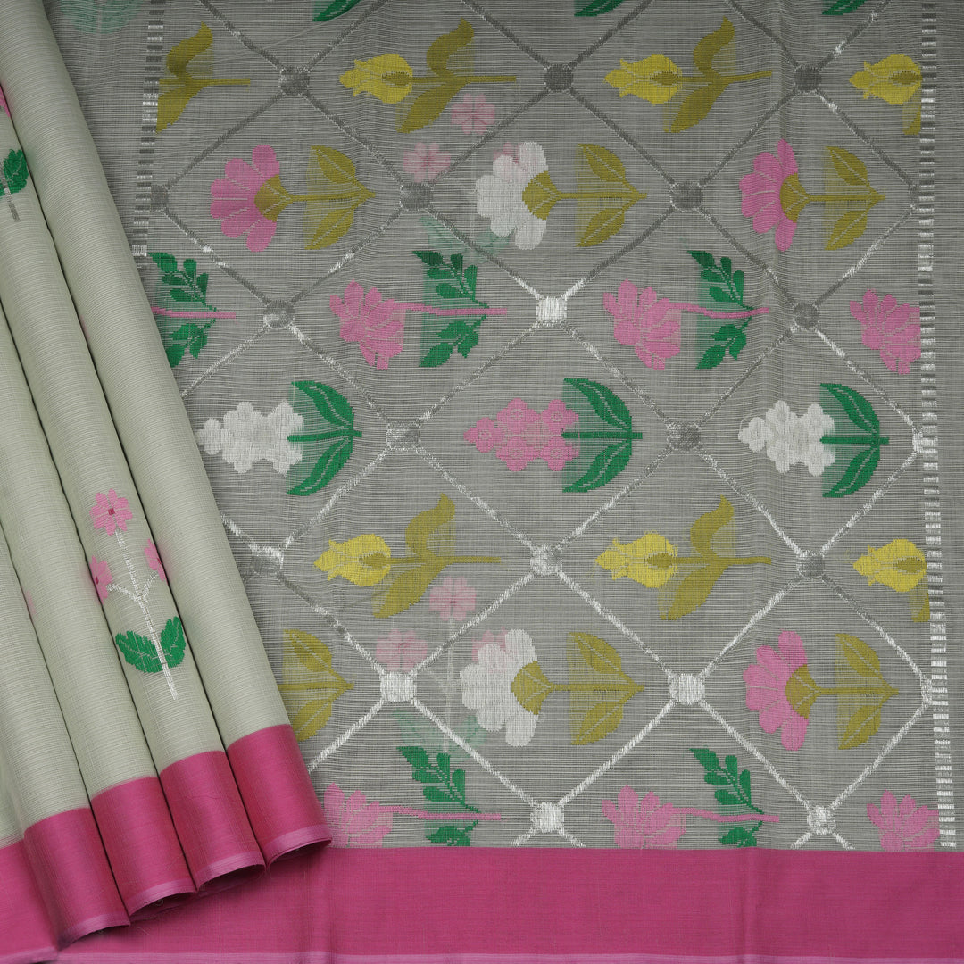 Light green Kota doria silk saree with silver zari floral motifs, silk thread flowers, diamond pallu and pink border with matching blouse