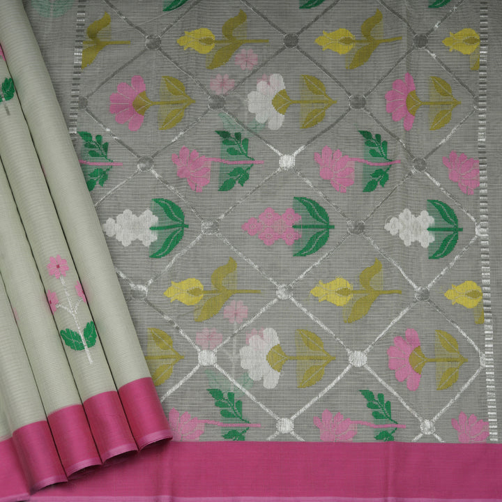 Light green Kota doria silk saree with silver zari floral motifs, silk thread flowers, diamond pallu and pink border with matching blouse