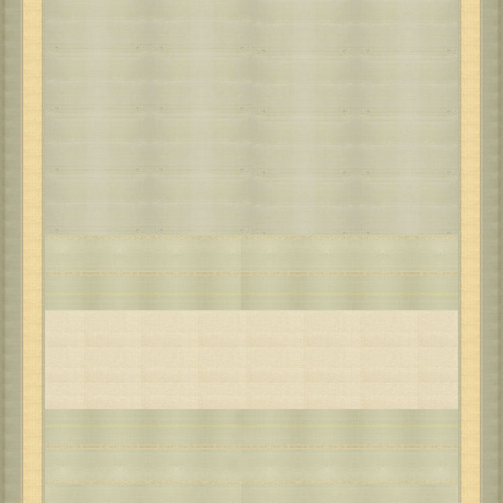 Light green Kanjivaram silk saree with gold zari diagonal chevron lines and striped panel pallu with matching blouse