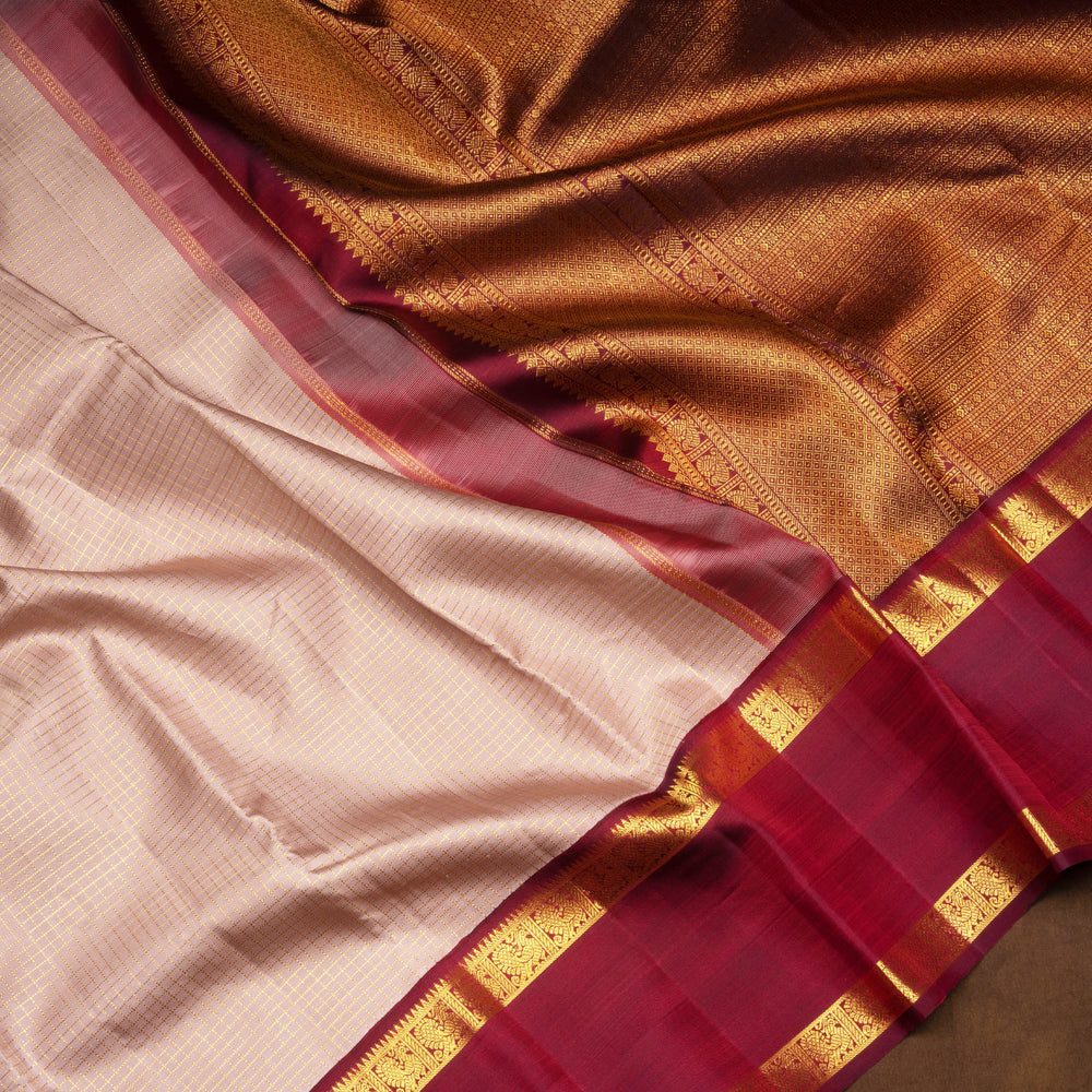 Mauve Kanjivaram silk saree with vairaoosi checks, maroon rettapet annam border and rich diamond pallu with matching blouse