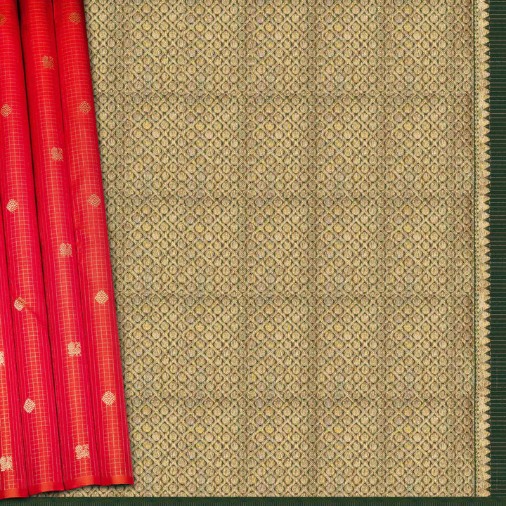 Orange Kanjivaram silk saree with pink-tone vairoosi checks, annam and vaira mookuthi butta, green pallu and matching blouse