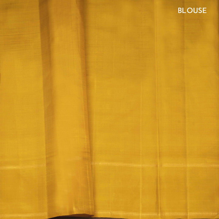 Dual-tone Sea green Kanjivaram silk saree with big checks, yellow rettapet border and gold lined pallu with matching blouse