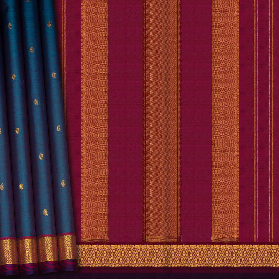 Blue Kanjivaram silk saree with mango butta, violet getti border and chevron diamond panel pallu with contrast blouse