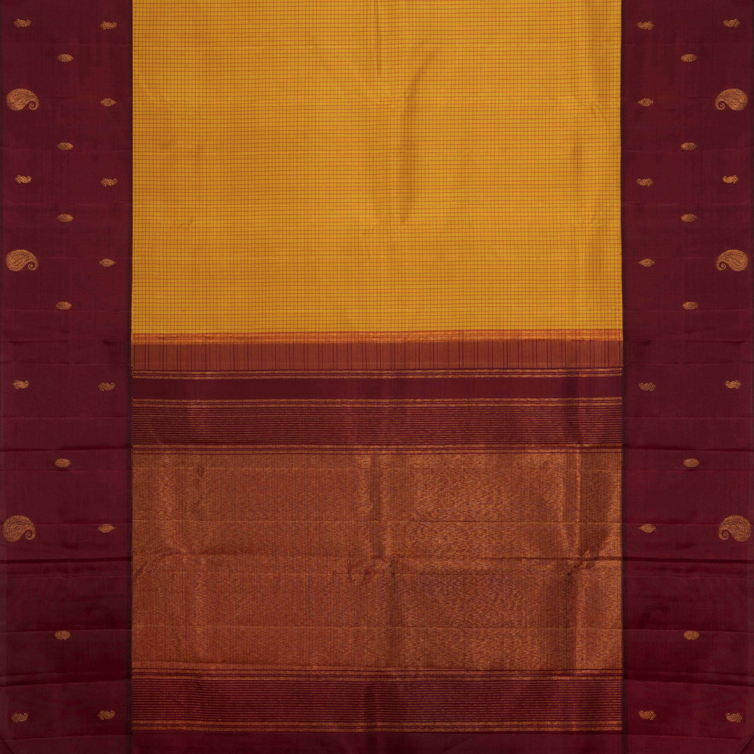 Yellow Kanjivaram silk saree with maroon checks, floral and mango butta border, and panel line pallu with matching blouse