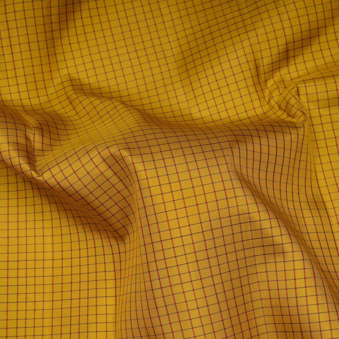 Yellow Kanjivaram silk saree with maroon checks, floral and mango butta border, and panel line pallu with matching blouse