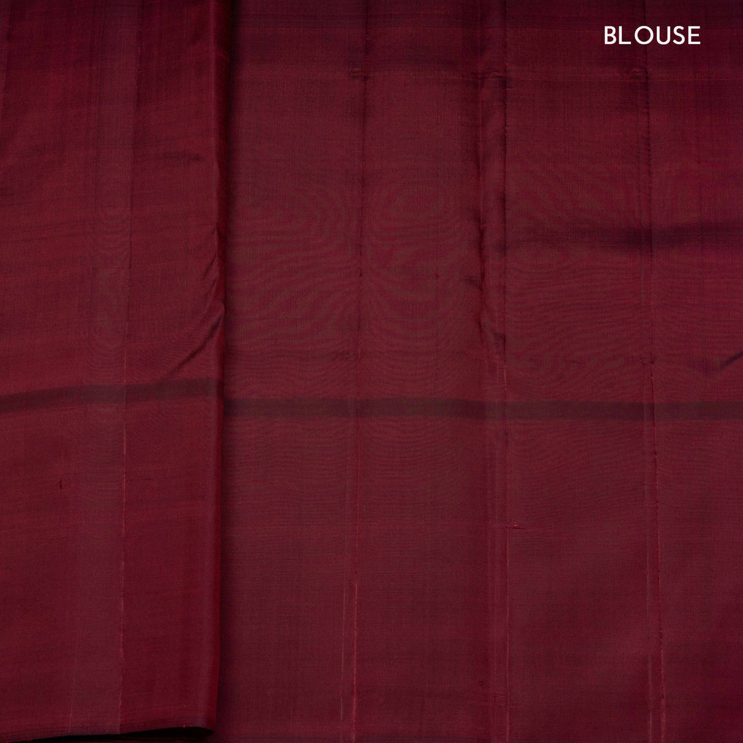 Yellow Kanjivaram silk saree with maroon checks, floral and mango butta border, and panel line pallu with matching blouse