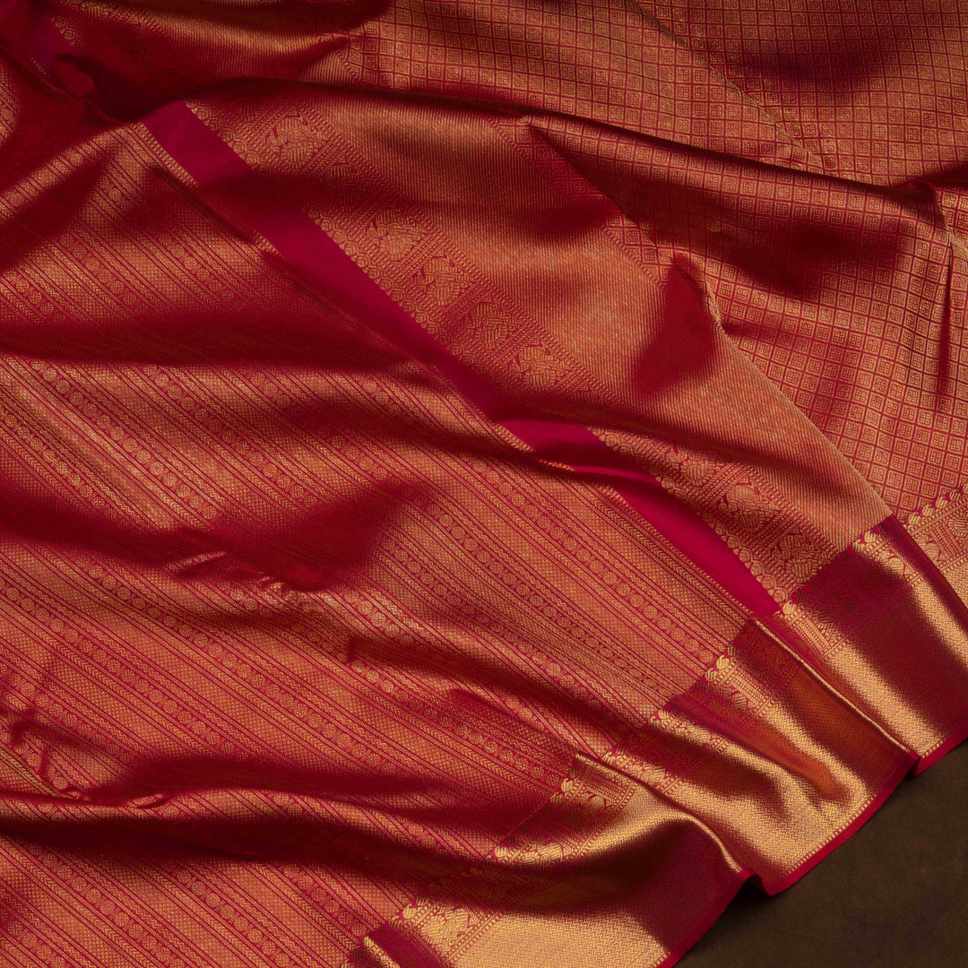 Red Kanjivaram silk saree with chevron, rudraksham, arrow lines, diamond band and annam mango border with matching blouse