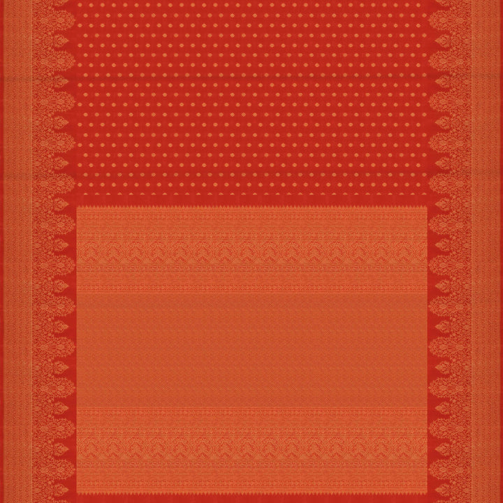 Orange Kanjivaram silk saree with allover diamond butta, turning border and rich pallu with rudraksham, chevron lines and retta killi motifs