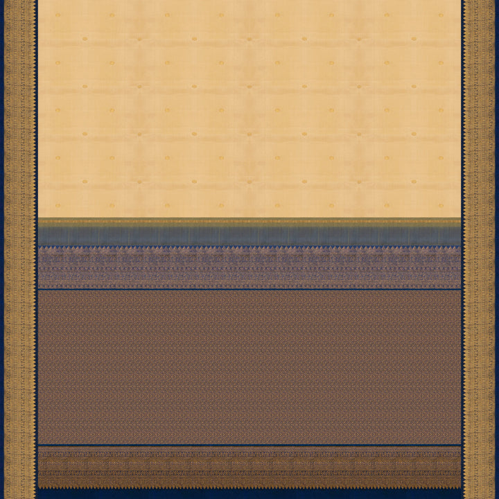 Cream Kanjivaram silk saree with chakram buttas, peacock blue border featuring chevron, rudraksham and floral lines, paired with plain blue blouse.