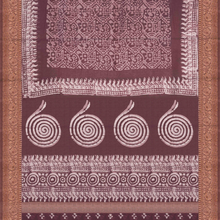 Brown handwoven silk cotton saree with batik design, gold zari floral border and artistic pallu