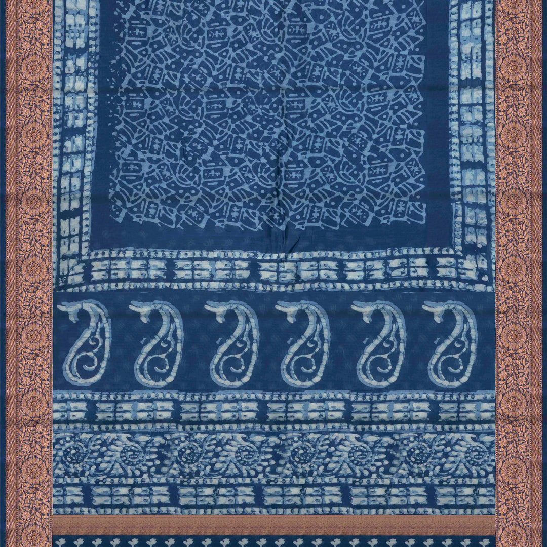 Blue Chanderi silk cotton saree with white batik print, copper zari floral border and batik mango pallu