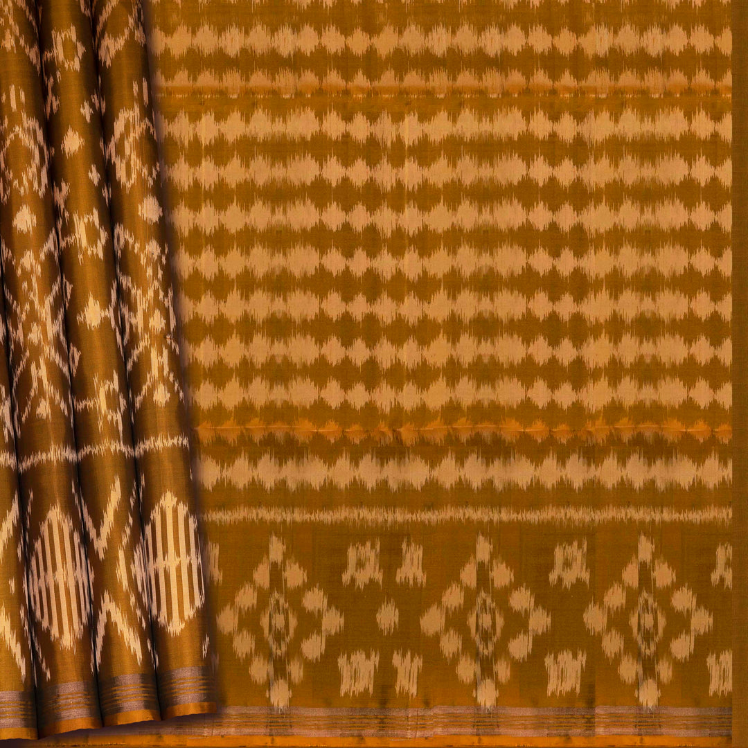 Mustard handwoven Ikat soft silk saree with white Ikat motifs and matching border