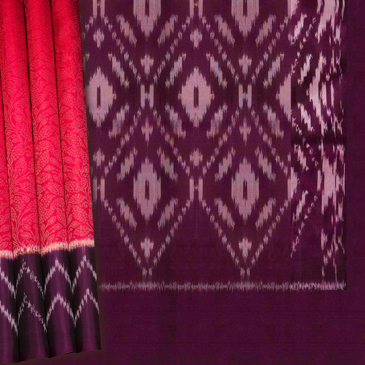 Pink handwoven Ikat soft silk saree with Banarasi floral motifs, violet Ikat border and diamond Ikat pallu