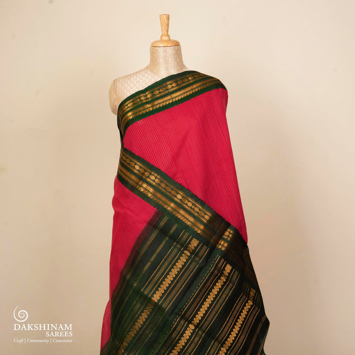Pink checked Gadwal cotton saree with green Korvai silk border, gold zari Rudraksham motifs and green pallu