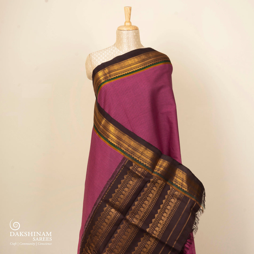 Violet checked Gadwal cotton saree with coffee brown Korvai silk border, gold zari diamond motifs and silk pallu