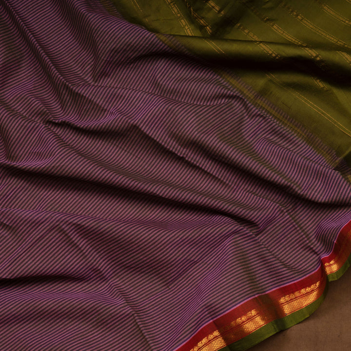 Violet Gadwal cotton saree with blue stripes, green border, gold zari detailing and striped pallu