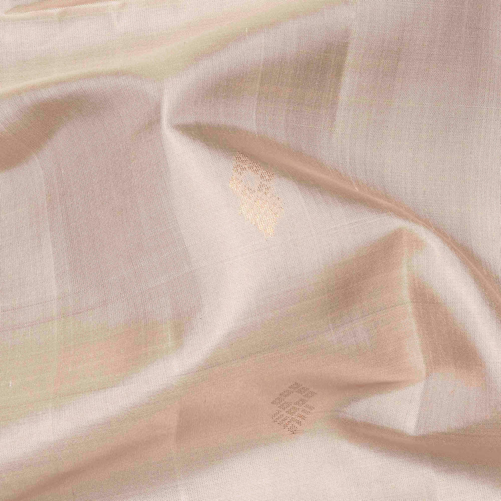 White handwoven soft silk saree with diamond motifs, red gold zari border and red pallu