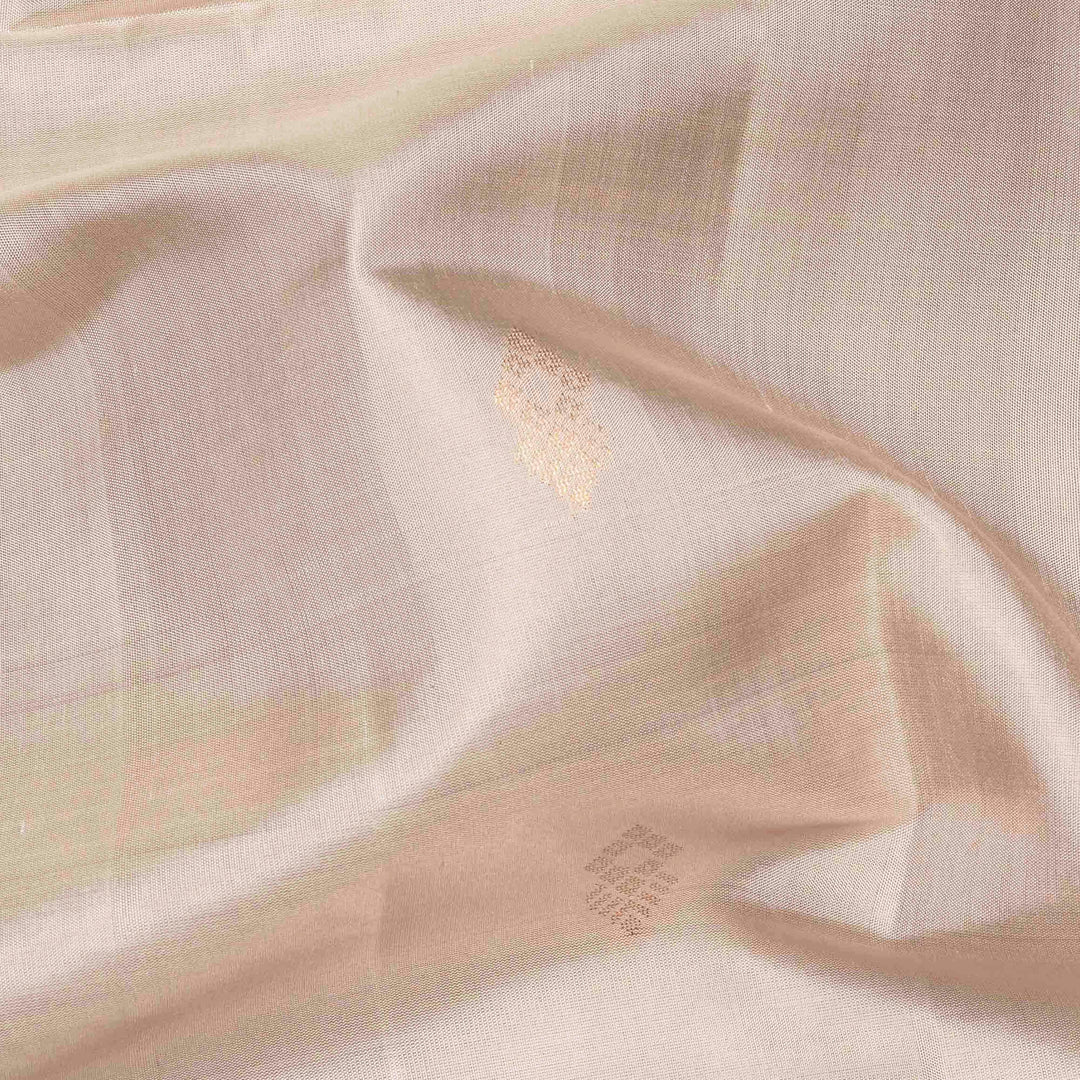White handwoven soft silk saree with diamond motifs, red gold zari border and red pallu