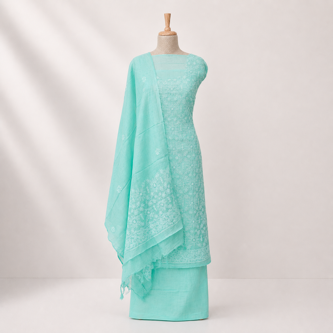 Teal green Tussar silk 3-piece suit set with hand embroidered Chikankari floral work and matching dupatta