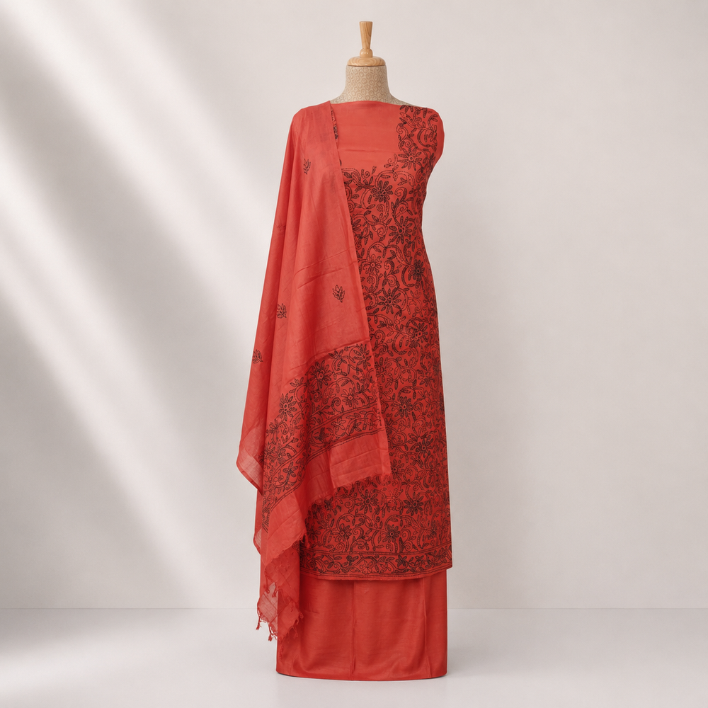 Orange Tussar silk 3-piece suit set with hand embroidered Kantha stitch floral work and matching dupatta