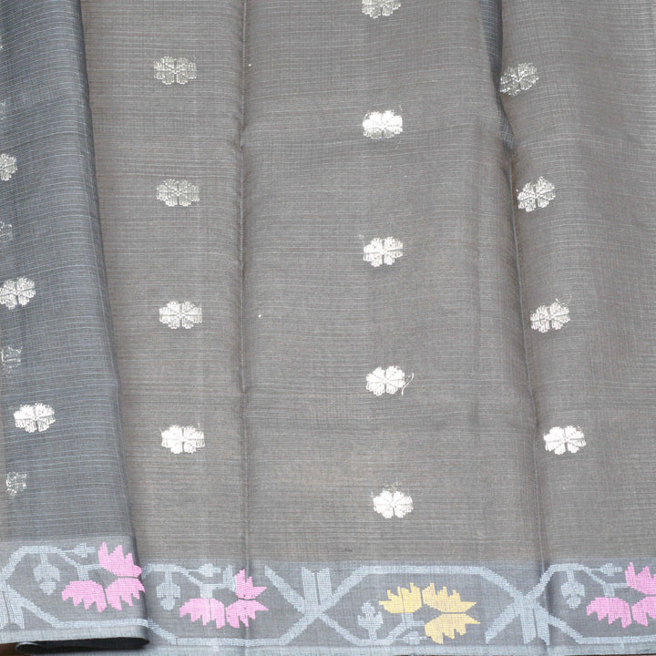 Grey Kota doria silk saree with silver zari floral butta, floral pallu and vine border with matching blouse