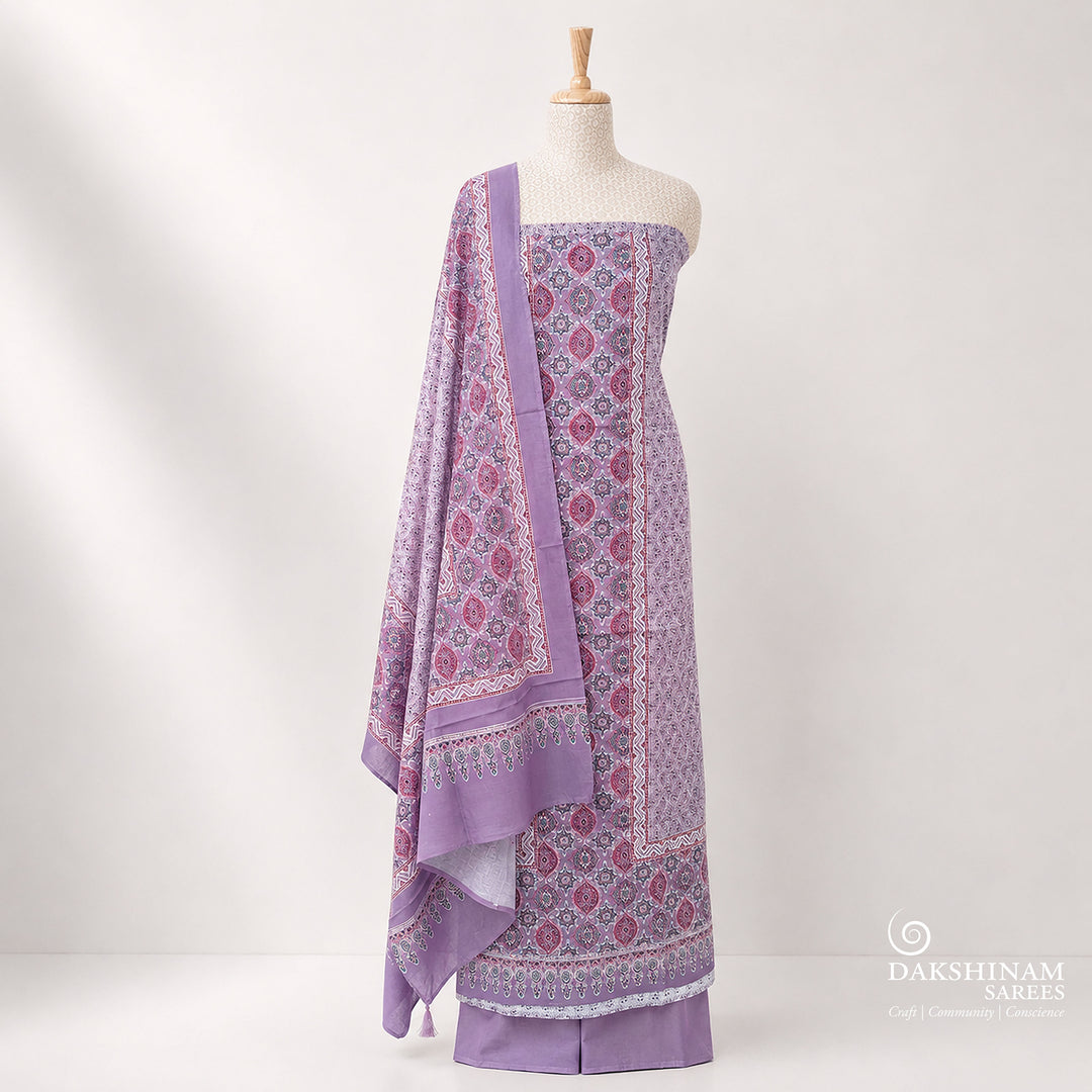 Lavender Ajrakh printed 3-piece cotton suit set with floral motifs, plain bottom and matching dupatta